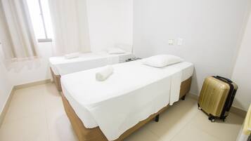 Twin kamer | Een minibar, gratis wifi, beddengoed