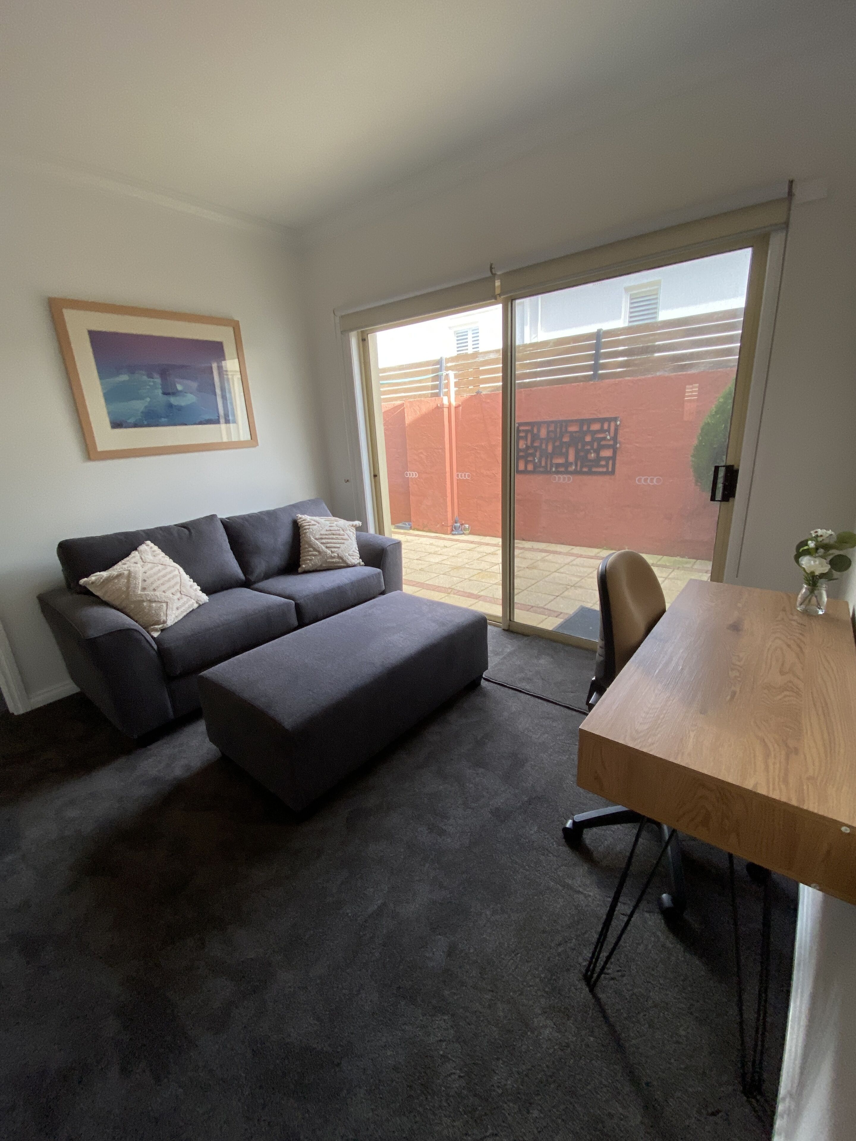 1 bedroom apartment  (unit 6) | living area | 42-inch smart tv with digital channels, dvd player