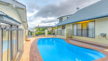 Outdoor pool, pool umbrellas, pool loungers