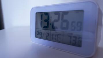 A digital clock displaying the time as 13:26.