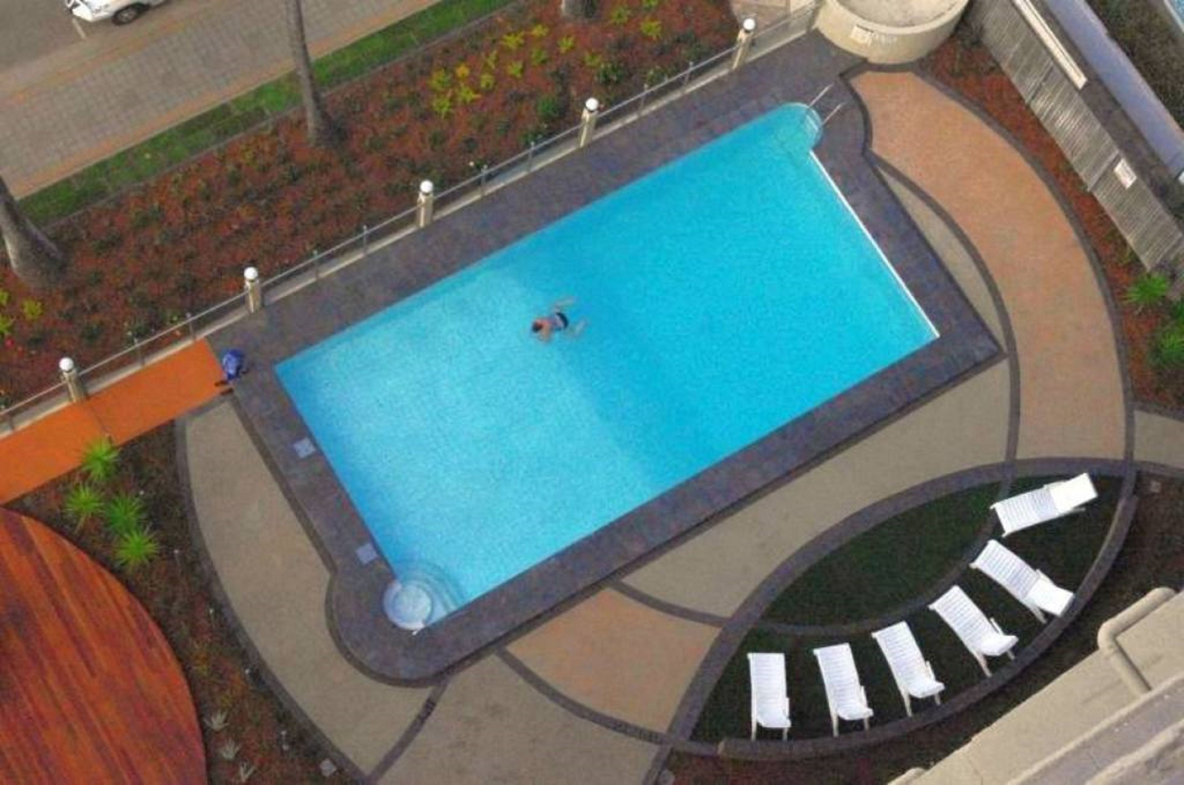 outdoor pool, open 6 am to 9:00 pm, pool loungers