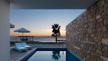 Outdoor pool, pool umbrellas, pool loungers