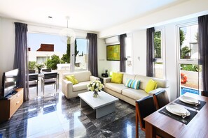 Villa, 1 Bedroom (Marine) | Living room | TV, fireplace, DVD player - Paradise Cove Beach Villas (Paphos)