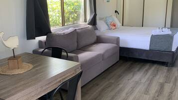 Economy Cabin - Sleeps 4 | Living area | TV, DVD player