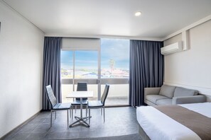 Superior Queen Town View | 1 bedroom, desk, laptop workspace, blackout drapes