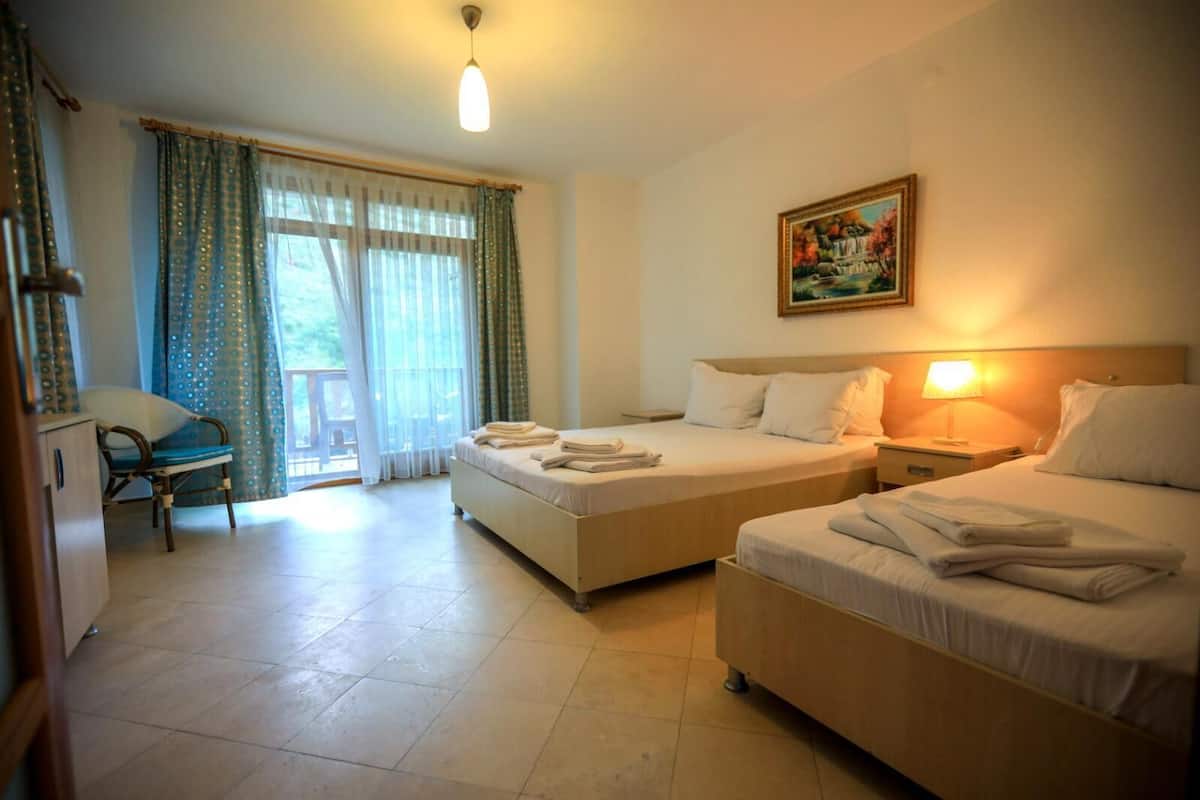 superior double room, terrace | minibar, in-room safe, desk, laptop workspace