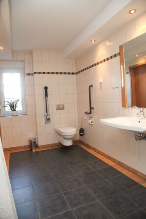 Shower, deep-soaking bathtub, free toiletries, hair dryer