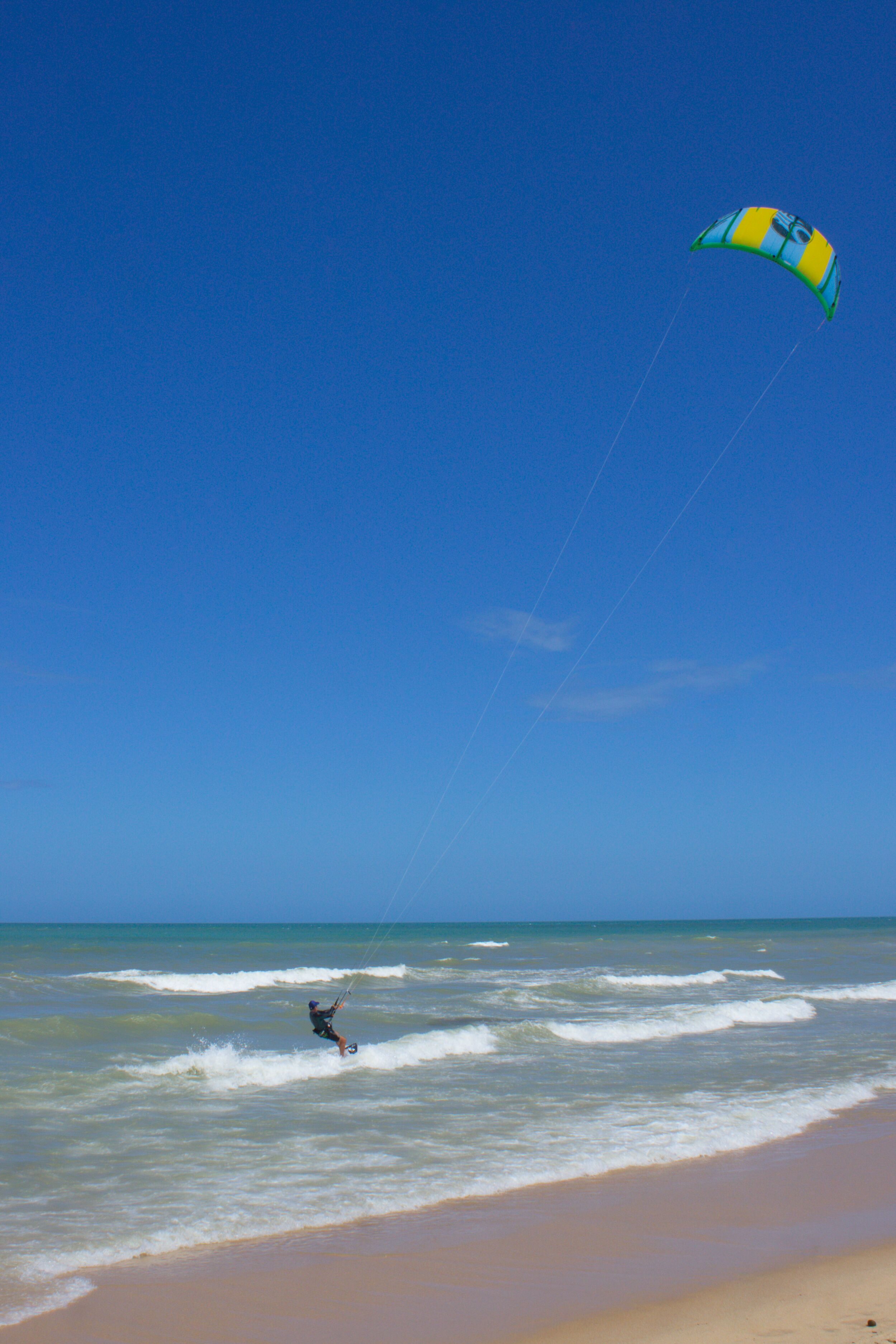 private beach nearby, white sand, beach towels, motor boating