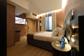 Kamar Ekonomi | Seprai premium, selimut bulu angsa, minibar, dan brankas