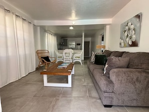Suite, 2 Bedrooms, Non Smoking | Living area | Flat-screen TV - L'Esperance Hotel (Philipsburg)