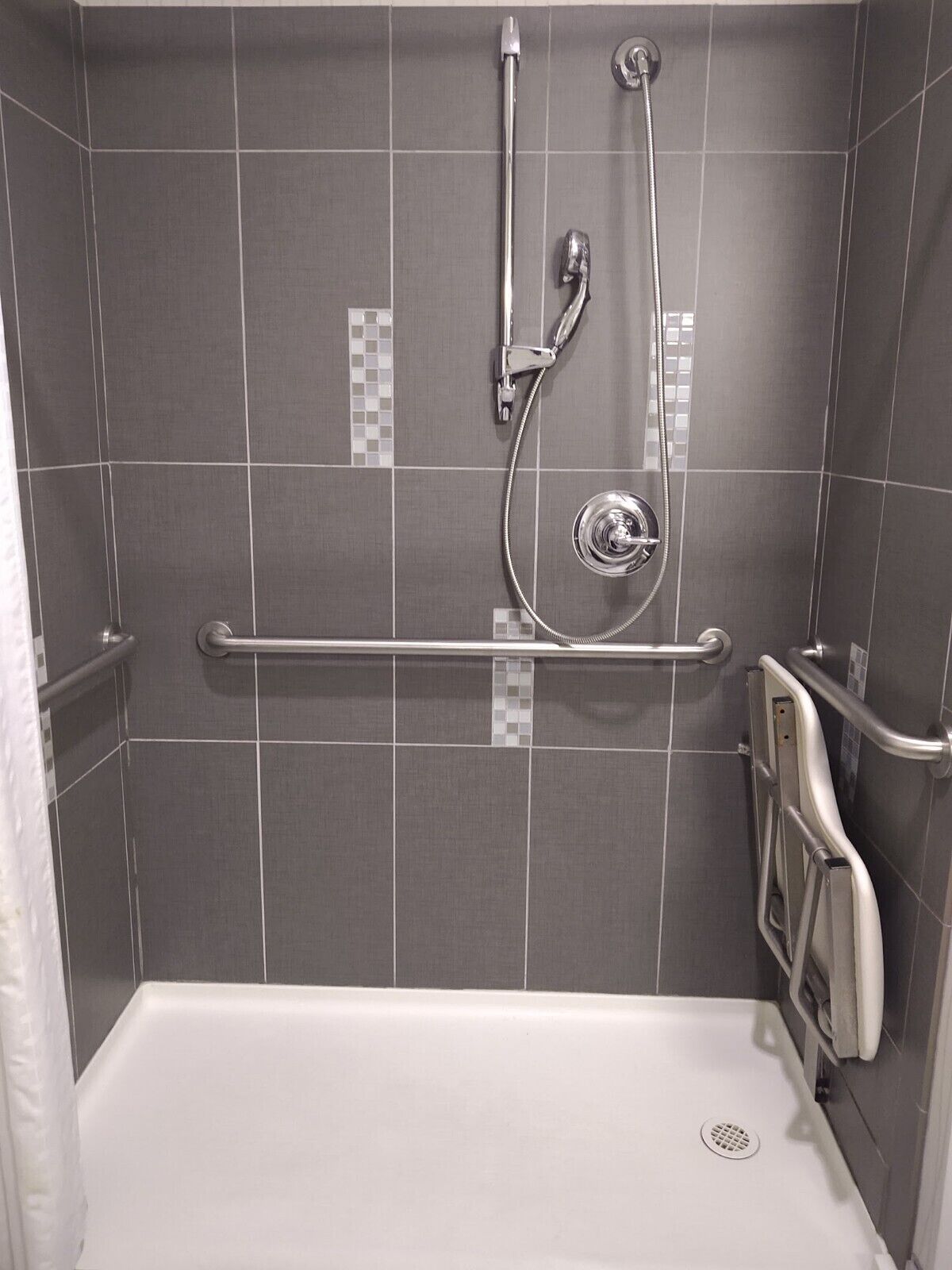 suite, 1 king bed with sofa bed, accessible, non smoking | bathroom | shower, hair dryer, towels