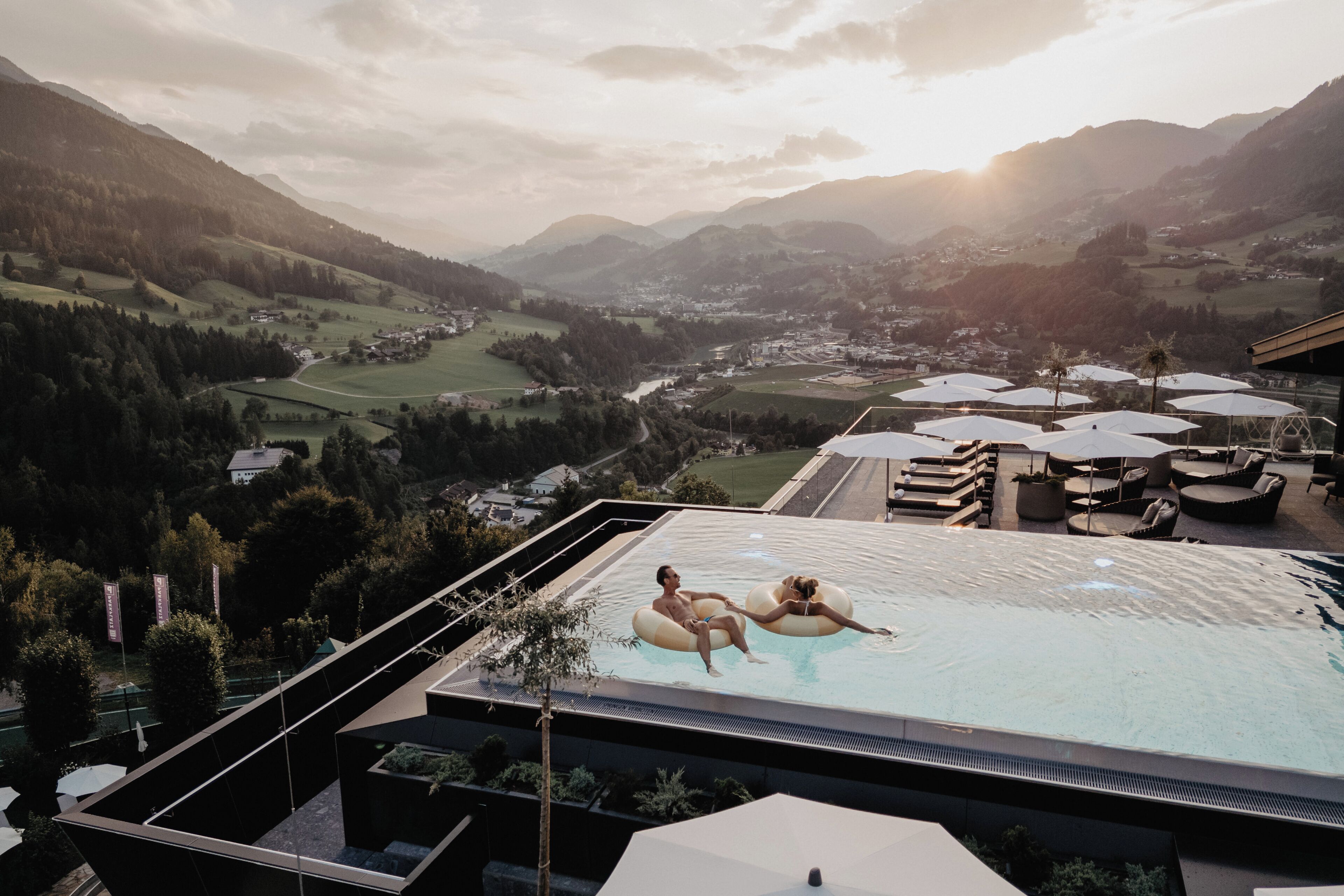 Indoor pool, outdoor pool, pool umbrellas, pool loungers