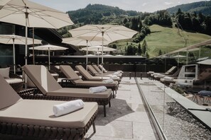 Indoor pool, outdoor pool, pool umbrellas, sun loungers