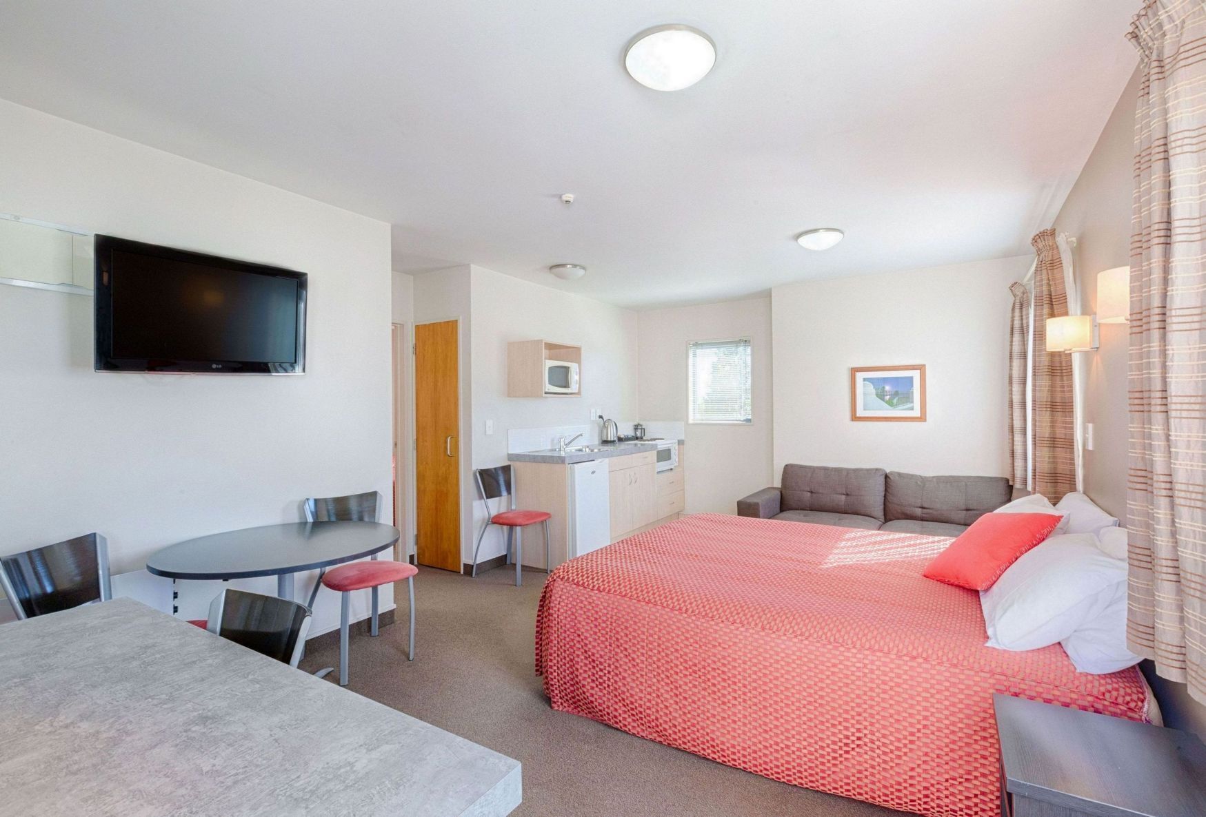 Desk, laptop workspace, blackout drapes, soundproofing