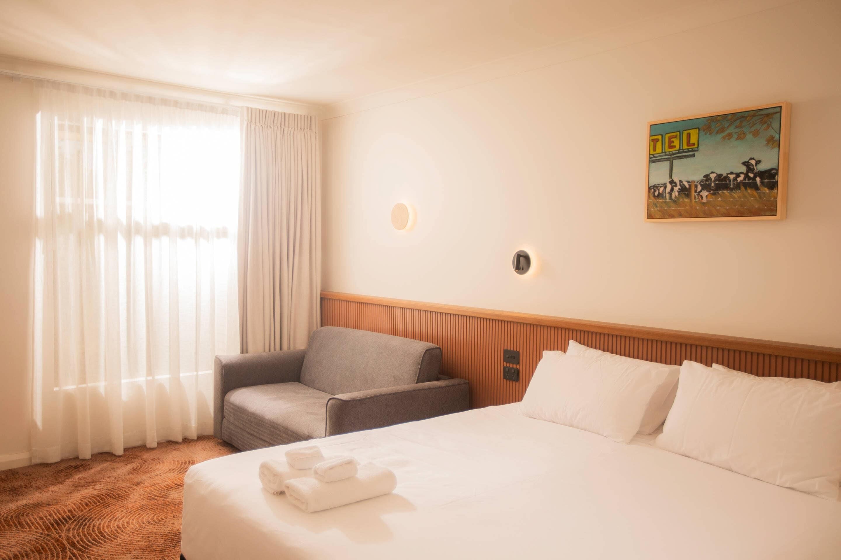 Habitación empresarial (King) | Tabla de planchar con plancha, cunas gratuitas y wifi gratis 