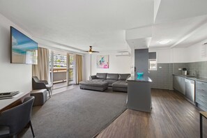 Family Suite, 3 Bedrooms, Courtyard View, Courtyard Area | Living room | TV, iPod dock