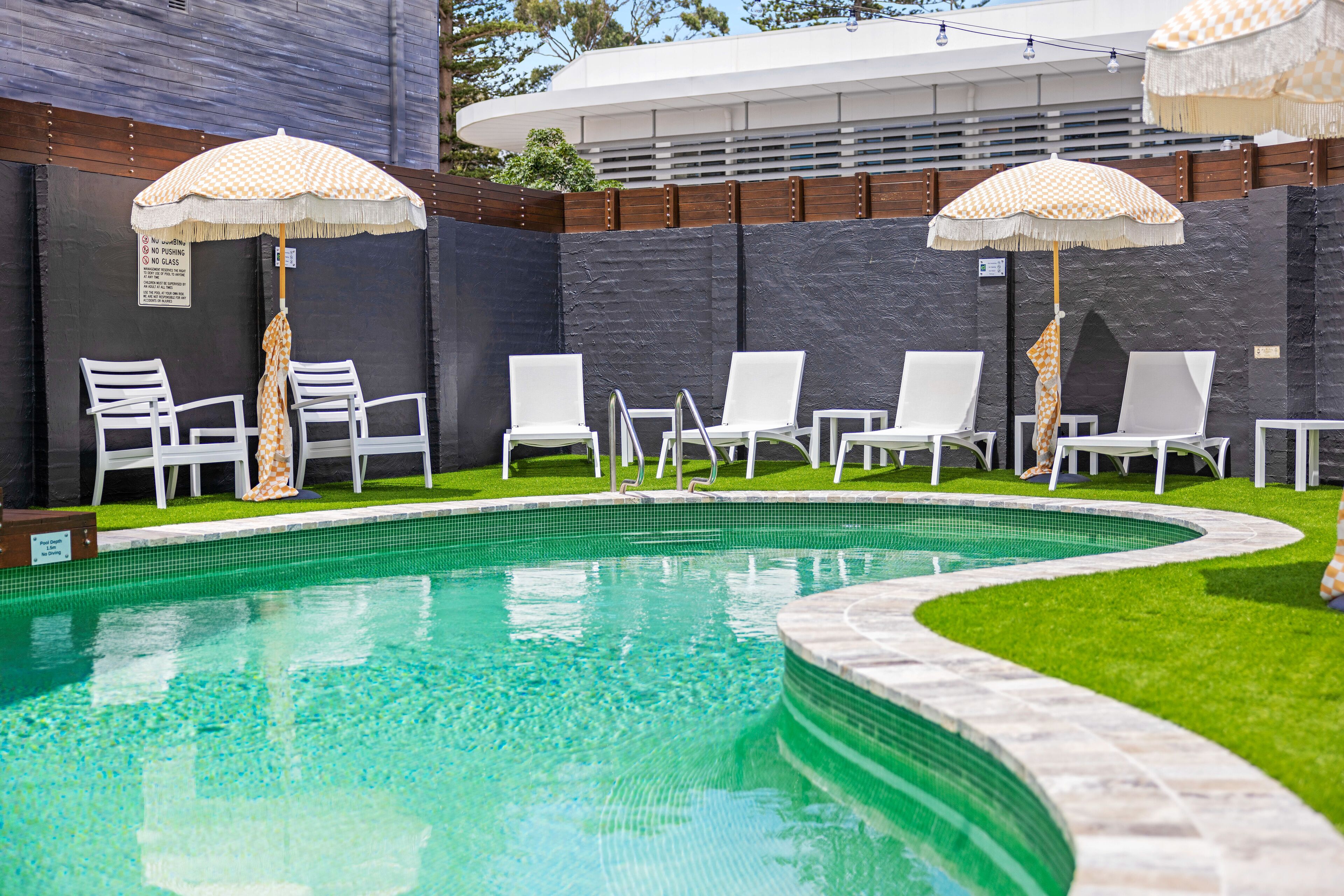 Outdoor pool, pool umbrellas, pool loungers