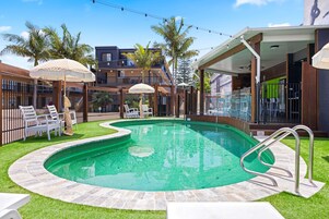 Outdoor pool, pool umbrellas, sun loungers