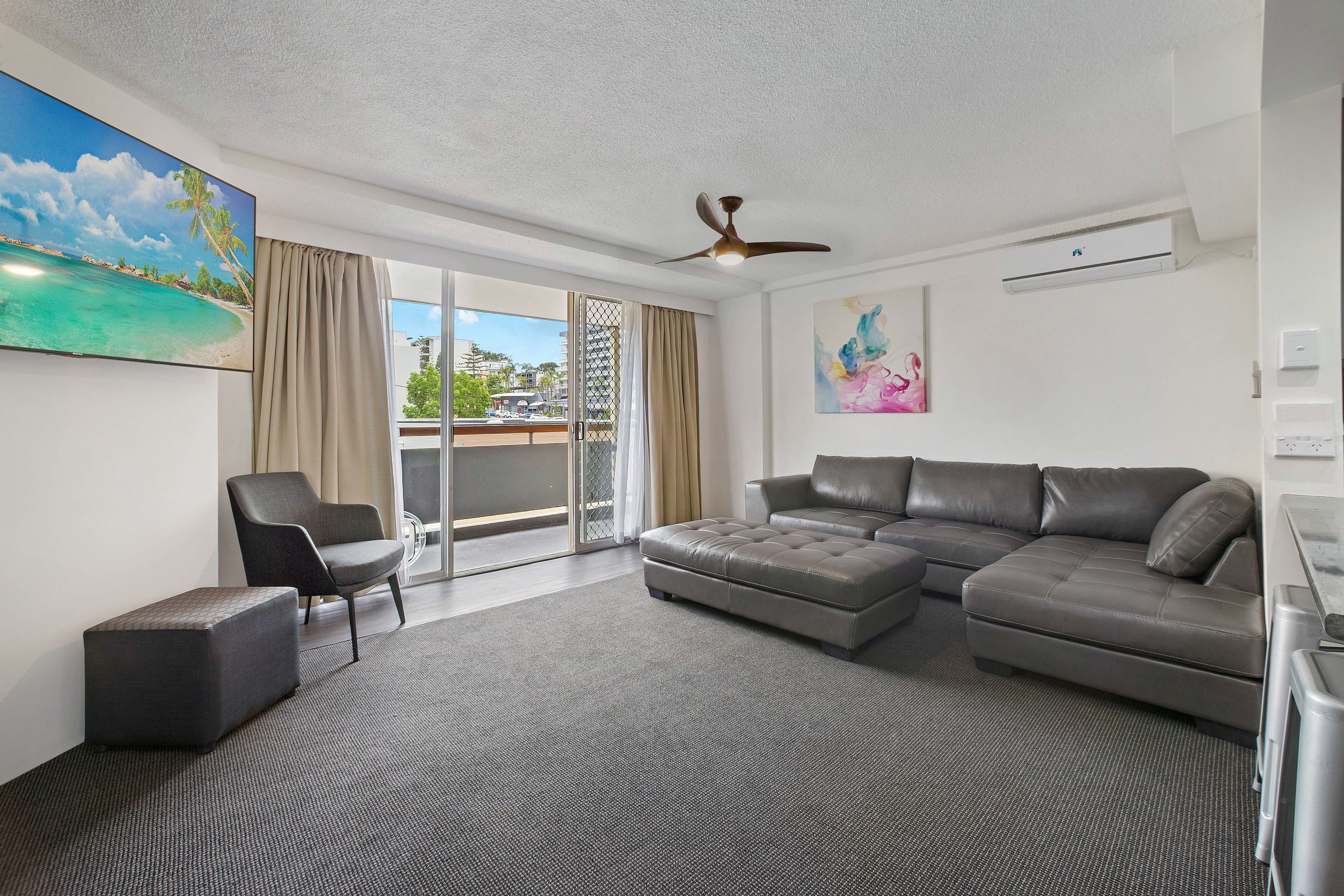 Family Suite, 3 Bedrooms, Courtyard View, Courtyard Area | Living area | TV, iPod dock