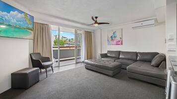 Family Suite, 3 Bedrooms, Courtyard View, Courtyard Area | Living area | TV, iPod dock