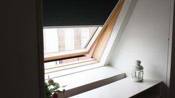 Desk, blackout curtains, iron/ironing board, cots/infant beds