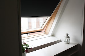 Desk, blackout curtains, iron/ironing board, cots/infant beds