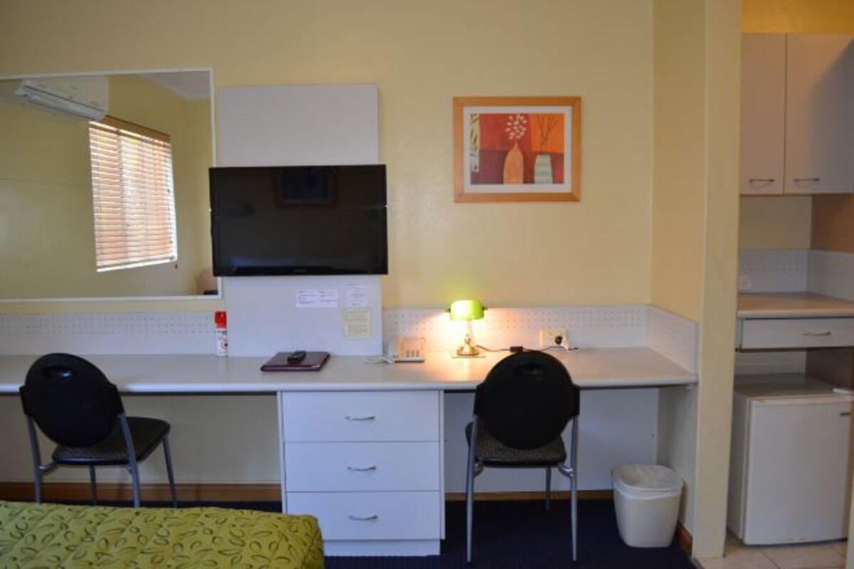 Desk, blackout drapes, iron/ironing board, cribs (free)