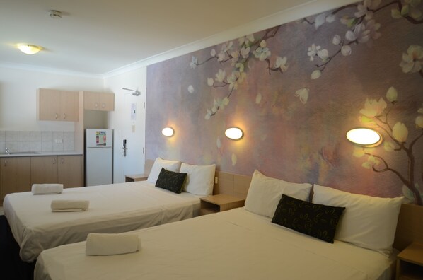 Standard Suite - Stair Access Only | Individually decorated, individually furnished, desk, blackout curtains - Airport Motel (Hamilton)