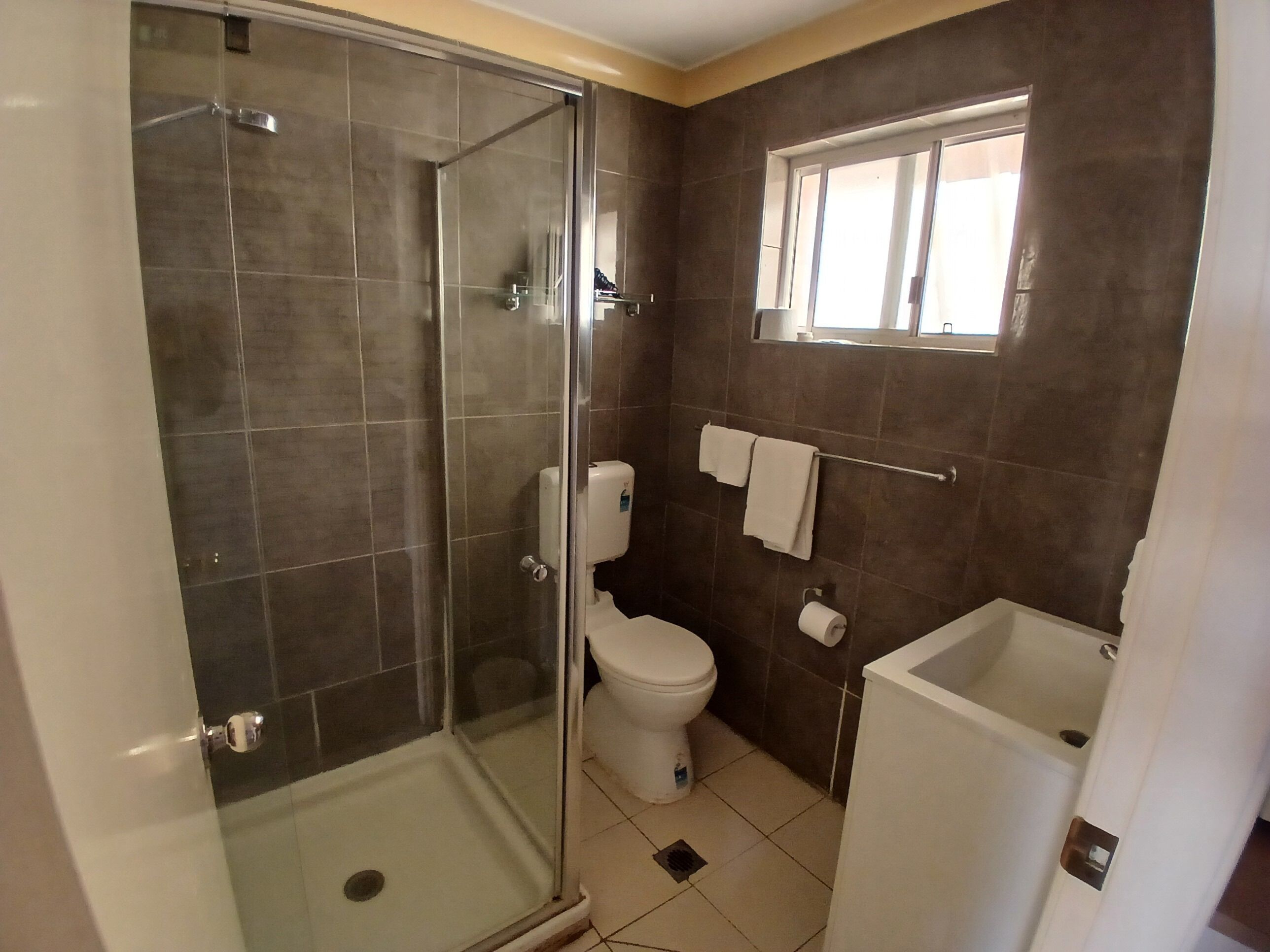 Room 5 (Queen and Single) | Bathroom | Shower, hair dryer, towels