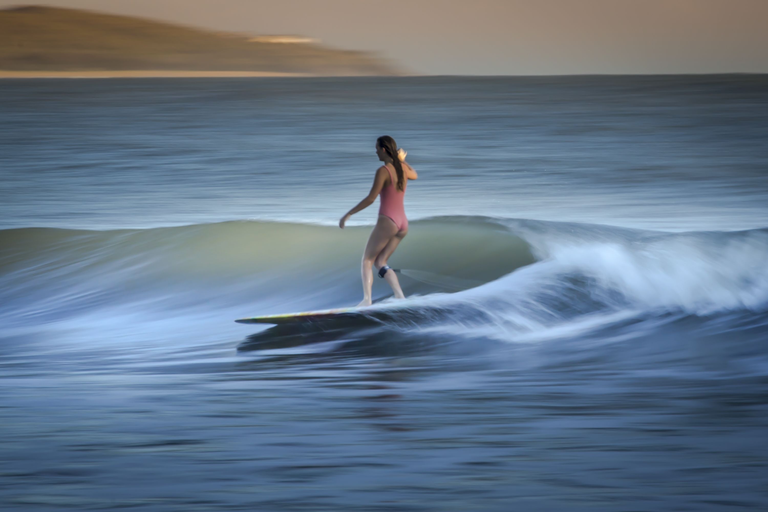 A person surfing on a wave.