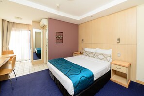 Deluxe Queen | Premium bedding, in-room safe, individually decorated