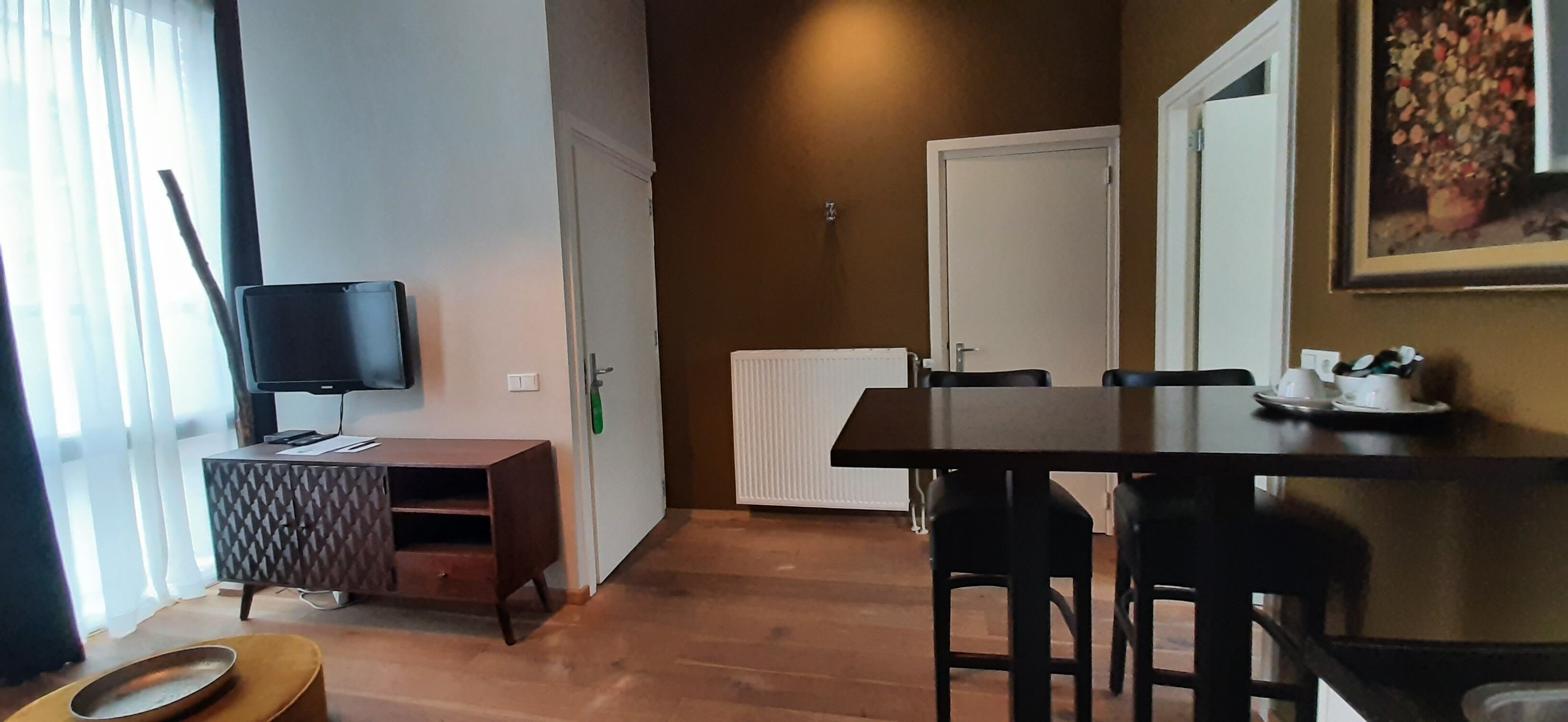 deluxe suite, terrace | living area | 15-inch flat-screen tv with cable channels, tv