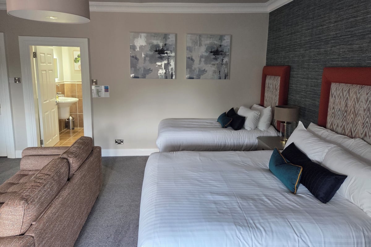 Family Triple Room | Iron/ironing board, WiFi (free), individually furnished, bed sheets