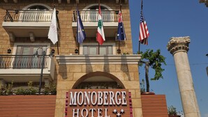The Monoberge Hotel with flags of the USA, EU, and Lebanon. - Monoberge Byblos Hotel (Byblos)