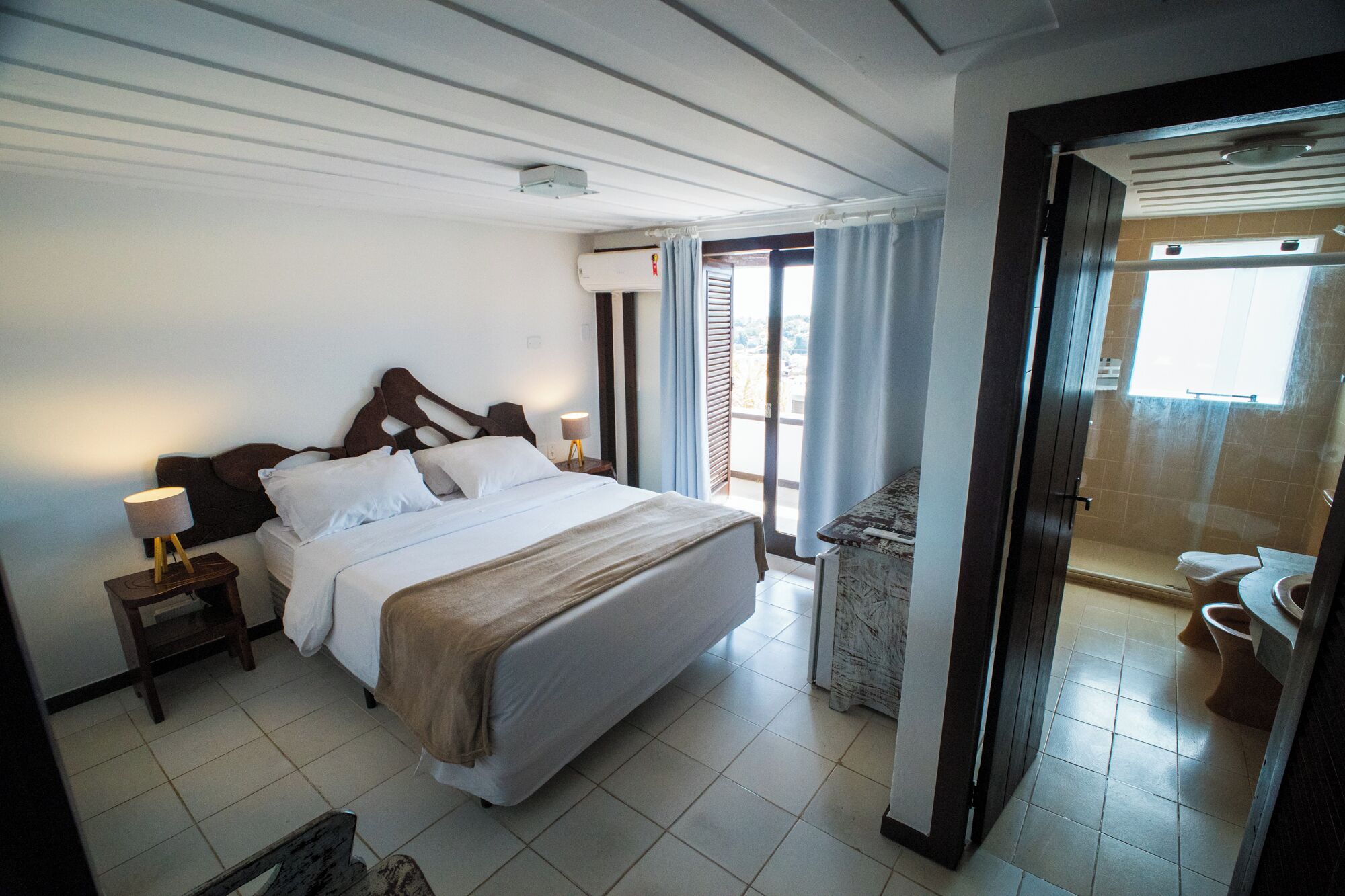 Standard Double Room | Minibar, in-room safe, desk, blackout drapes