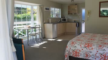 Deluxe Studio | Private kitchenette | Fridge, microwave, stovetop, coffee/tea maker