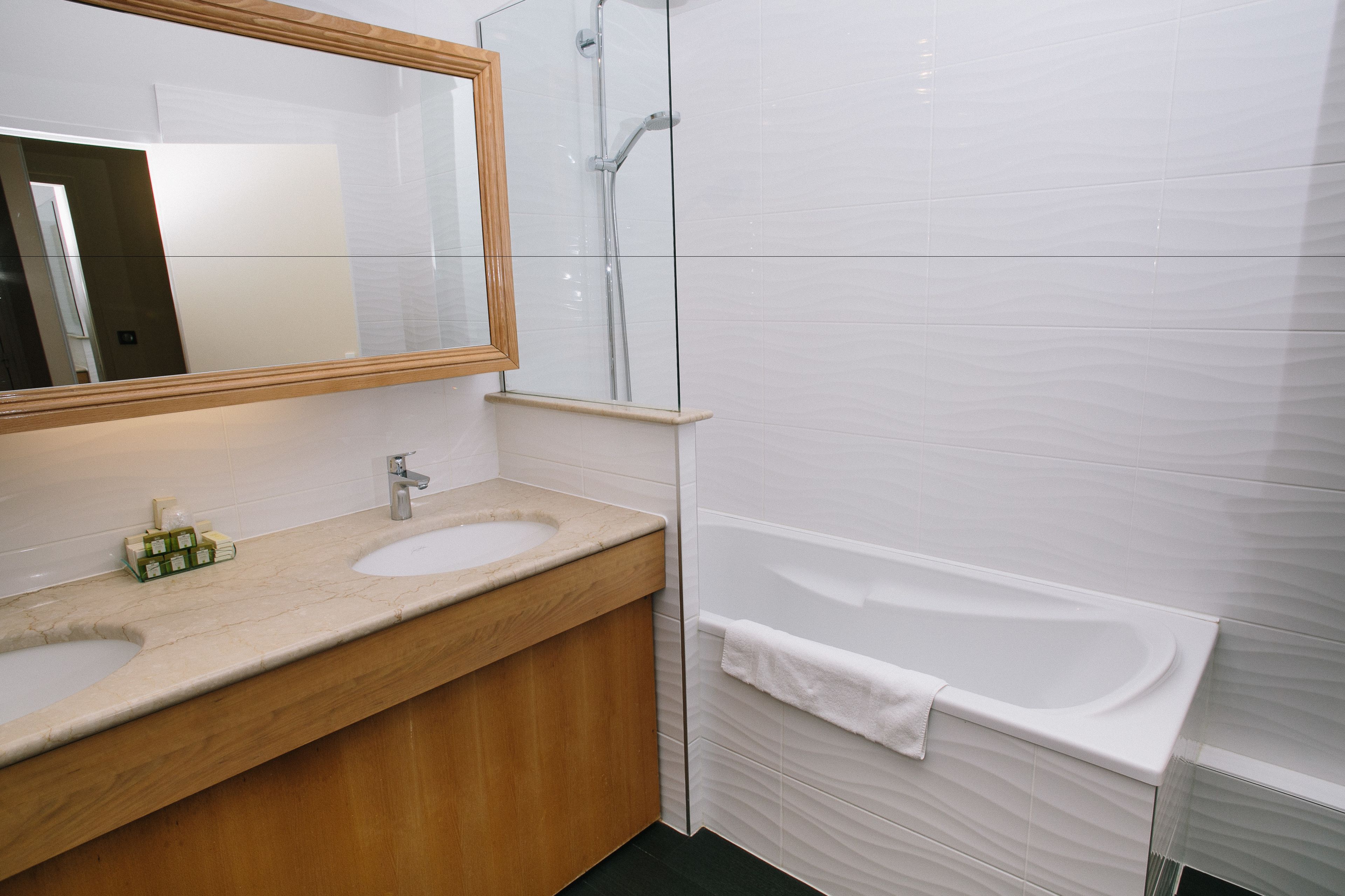 family room bathtub  | bathroom | free toiletries, hair dryer, towels