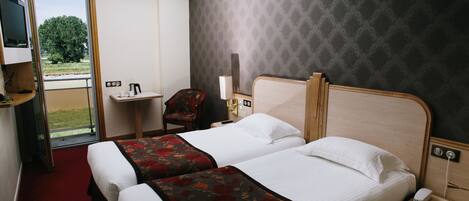 Desk, blackout drapes, free cribs/infant beds, rollaway beds