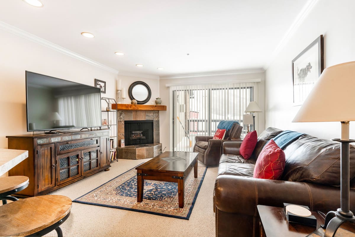 1-Bedroom Condominium #24 | Living area | Fireplace, DVD player