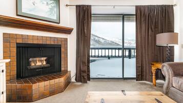 1-Bedroom Condominium #26 | Living area | Fireplace, DVD player
