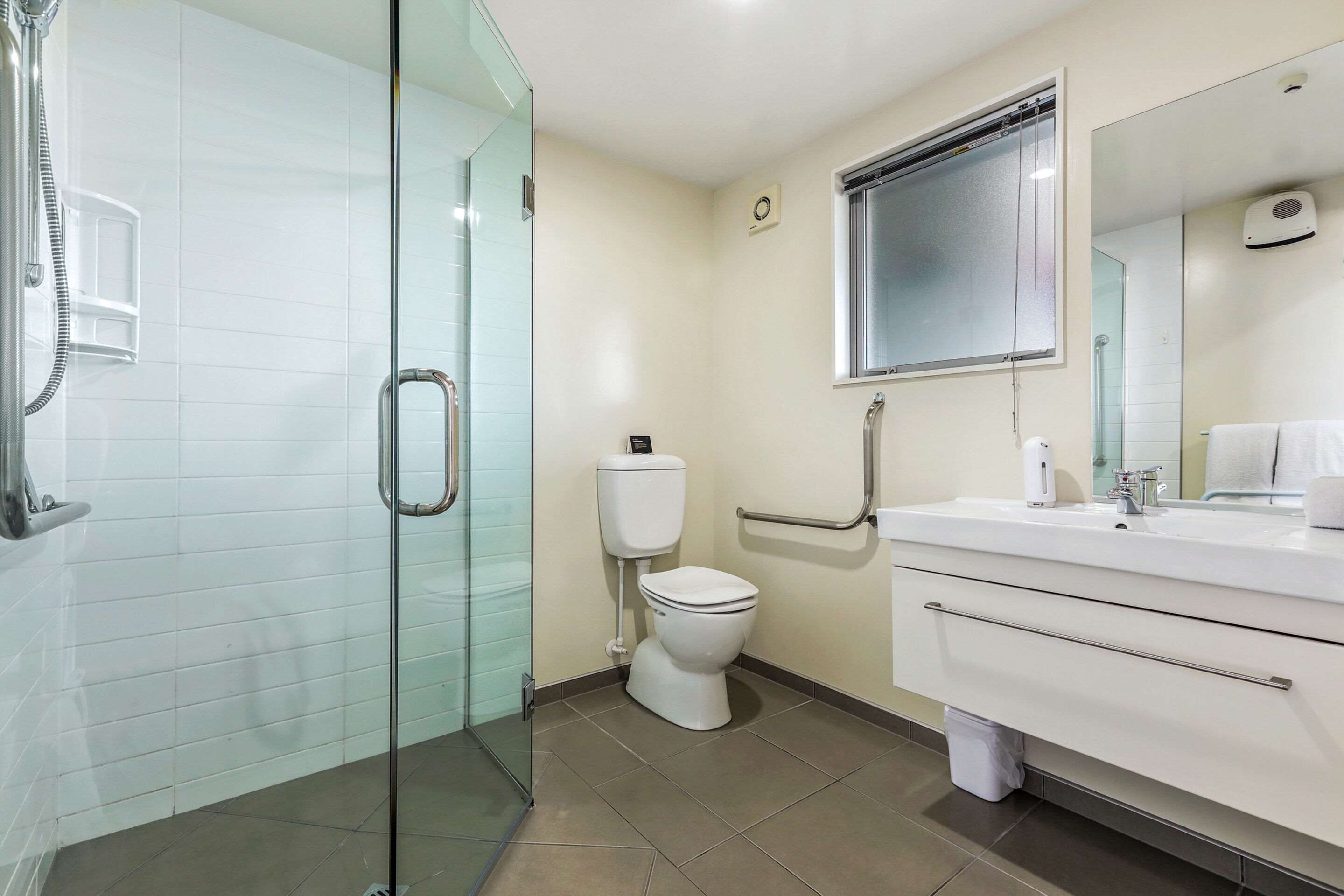 basic studio | bathroom | hair dryer, towels
