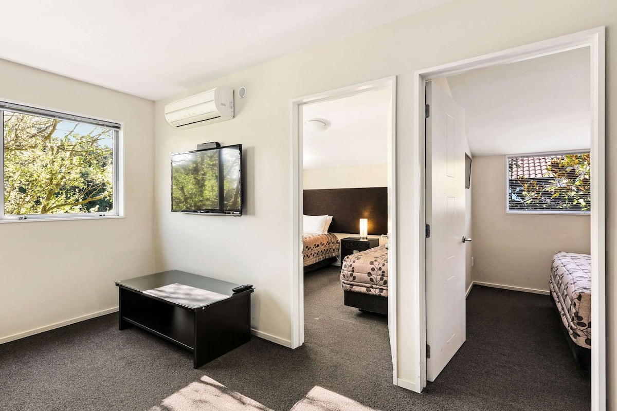 suite, multiple beds, non smoking (2 bedroom, king) | desk, soundproofing, iron/ironing board, cots/infant beds