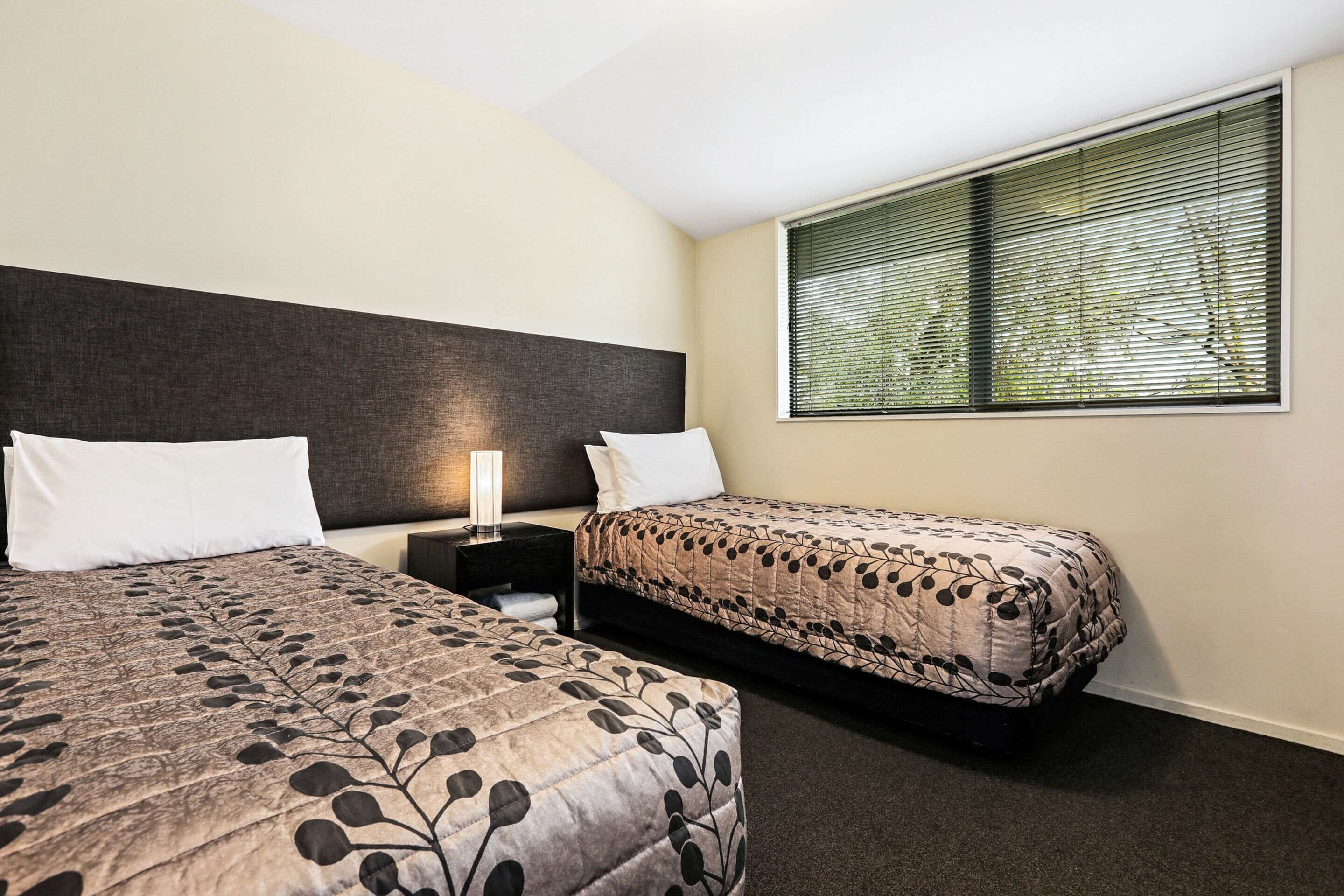 suite, multiple beds, non smoking (2 bedroom, king) | desk, soundproofing, iron/ironing board, cots/infant beds