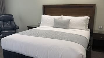 Deluxe King Room | Premium bedding, down comforters, pillowtop beds, blackout drapes