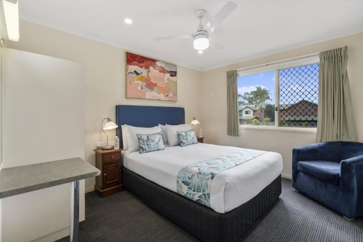 Two-Bedroom Apartment | Premium bedding, blackout curtains, soundproofing, iron/ironing board