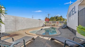 Outdoor pool, open 7:30 AM to 7:00 PM, free pool cabanas, pool umbrellas