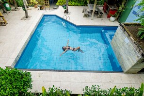 Outdoor pool, open 8:00 AM to 10:00 PM, pool loungers