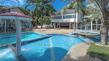 4 outdoor pools, open 9:00 AM to 9:00 PM, pool umbrellas, sun loungers