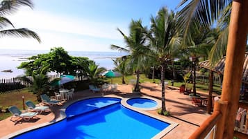 Outdoor pool, pool umbrellas, sun loungers