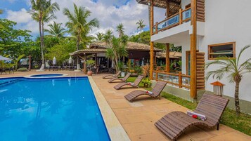 Outdoor pool, pool umbrellas, sun loungers